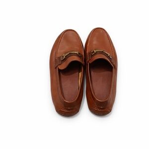 Brown loafers from the brand Cole Haan at men size 10.